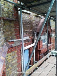 Paint removal uncovers damage to bricks, tiles and concrete