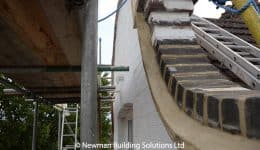 Repairs to bricks and mortar above gable