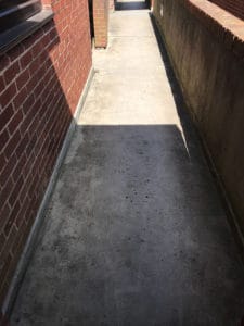 external balcony walkway prior to application of rapid cure waterproof and anti-slip coating