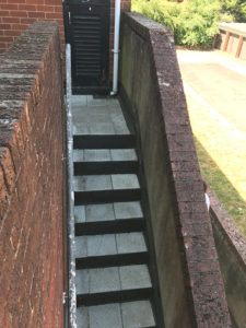 External staircase prior to removal on non-slip tiles