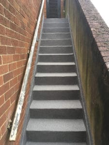 Stairwell coated with Polyac Rapid, rapid cure, anti-slip-waterproofing system.
